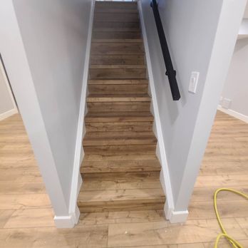 Drummond Built - Custom Vinyl upgrade to stairs - General Contractors Near Me