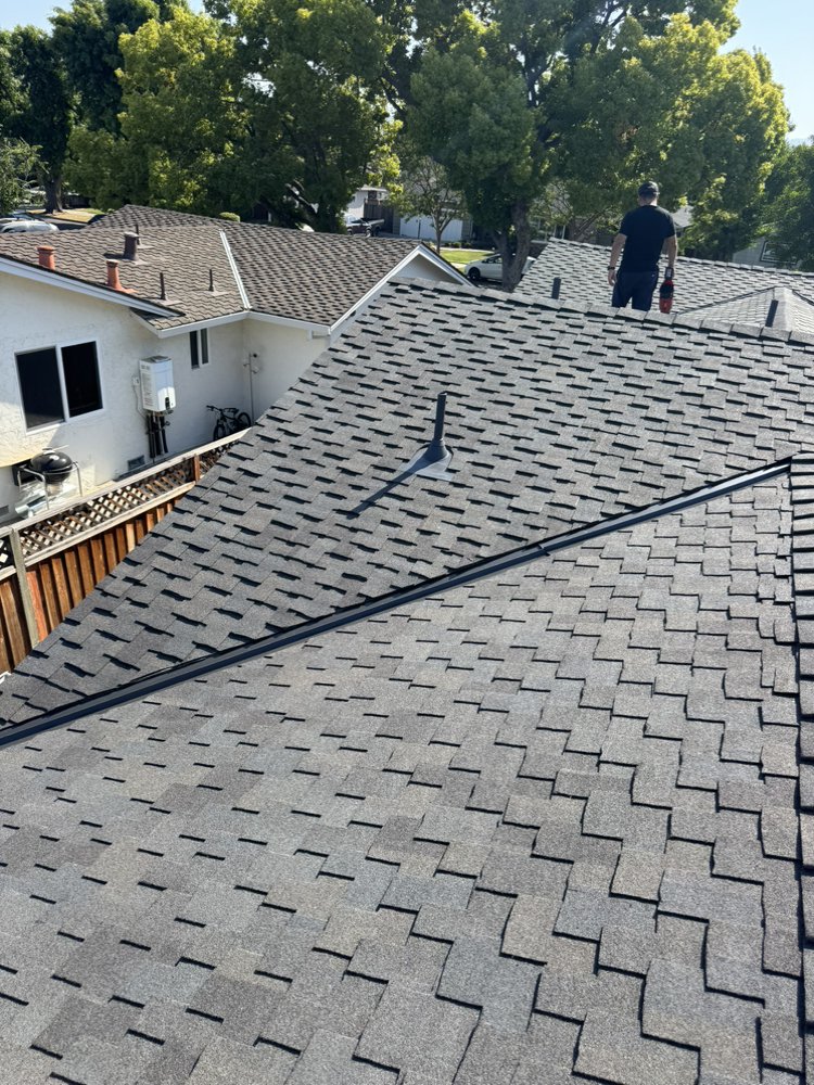 Slide of E & E Roofing