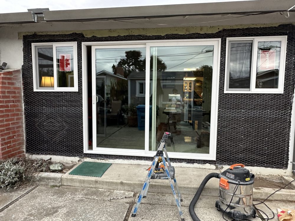 Slide of Umbrella Plastering & Roofing