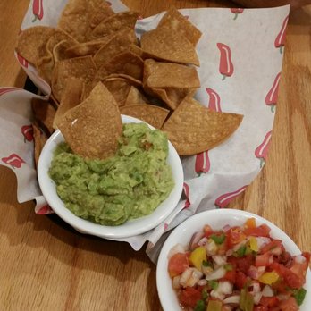 The New Mexicans - Chips salsa, a tad overcooked, generous fresh guacamole and pico. - New Mexican Cuisine Near Me - Everett, Washington