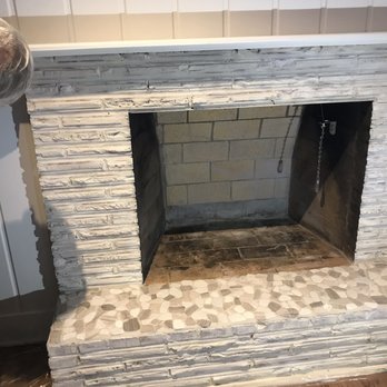 Lindemann Chimney Heating & Cooling - New firewall in back of fireplace, river rock hearth and painted brick fireplace - Chimney Sweeps Near Me - Lake Bluff, Illinois Lindemann Chimney Heating & Cooling - New firewall in back of fireplace, river rock hearth and painted brick fireplace - Chimney Sweeps Near Me - Lake Bluff, Illinois