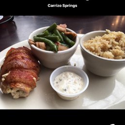Bacon wrapped Chicken Breast, green beans with bacon & rice! It was the special of the day, iced tea included. Bacon wrapped Chicken Breast, green beans with bacon & rice! It was the special of the day, iced tea included.