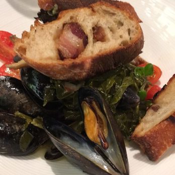 One Flew South - Mussel and collar green appetizer - New American Near Me - Atlanta, Georgia One Flew South - Mussel and collar green appetizer - New American Near Me - Atlanta, Georgia