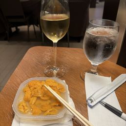 Small container of uni, eaten at a nearby hotel lobby (: Small container of uni, eaten at a nearby hotel lobby (: