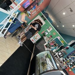 Seaside Sammies - Inside the store. Only two smalll tables with two chairs each.