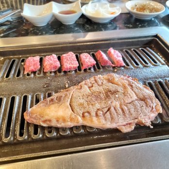 Buga Korean BBQ - The 6 Oz Rib-eye and 6 total pieces of the rkb fillet we were served from their most expensive AYCE menu for 2 people. Yikes - Barbeque Near Me - San Diego, California
