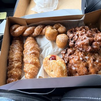 Fox's Donut Den - Apple fritters, glazed croissants, cinnamon twist, raspberry filled and a couple donut holes for the win! - Donuts Near Me - Nashville, Tennessee