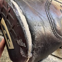 Joseph's Shoes & Repair - Very hard dried glue on seams, leather and sole.