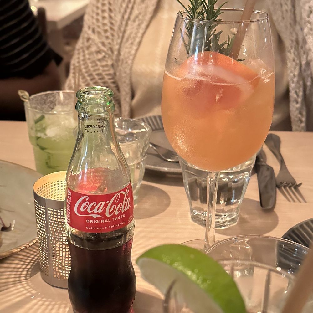 Graffiti Raw - Cocktails: Cuba Libre & a grapefruit mocktail - Seafood Near Me - Houston, Texas
