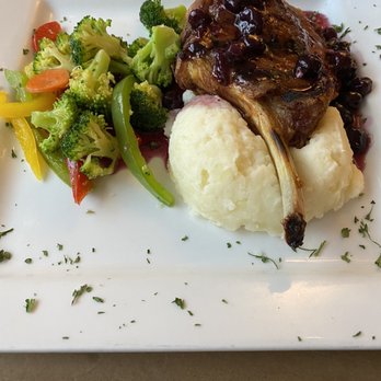 Serenity Bistro - Porter House Pork Chop - New American Near Me - West Yellowstone, Montana