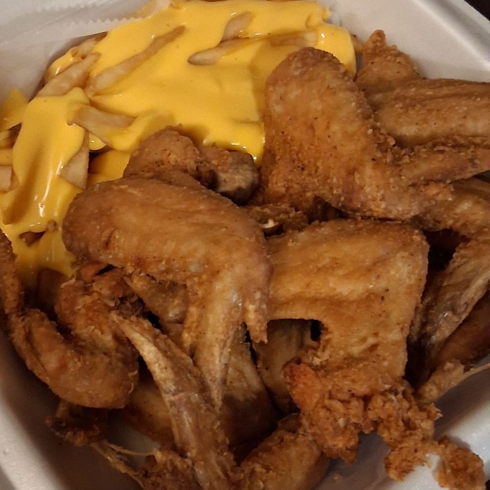 Chicken A Peel - 10 whole wings and cheese fries for $13 - New American Near Me - Saint Louis, Missouri Chicken A Peel - 10 whole wings and cheese fries for $13 - New American Near Me - Saint Louis, Missouri