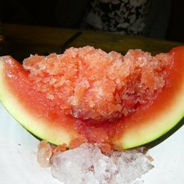 Watermelon and strawberry slushie served with Campari.