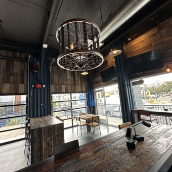 Dutch Bros Coffee - Bicycle Wheel and chain chandelier. Great wooden tables. - Coffee & Tea Near Me - Portland, Oregon Dutch Bros Coffee - Bicycle Wheel and chain chandelier. Great wooden tables. - Coffee & Tea Near Me - Portland, Oregon