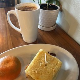 Bacon, egg, and cheese biscuit and chai latte Bacon, egg, and cheese biscuit and chai latte