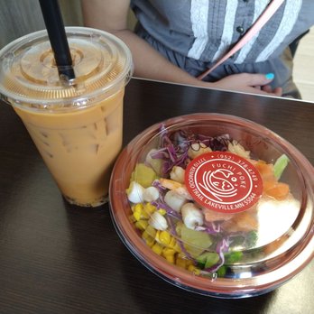 Fuchi Poke - a salad and a drink on a table - Poke Near Me - Lakeville, Minnesota
