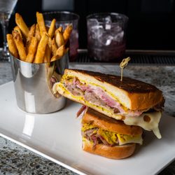 Cuban, house cured and smoked pork loin, Hawaiian pulled pork, pickle