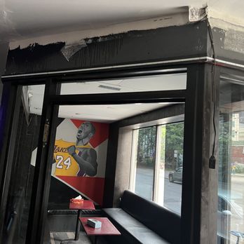 Ali Basha - the inside of a restaurant with a mural of a basketball player on the wall - Hookah Bars Near Me - Toronto, Ontario Ali Basha - the inside of a restaurant with a mural of a basketball player on the wall - Hookah Bars Near Me - Toronto, Ontario