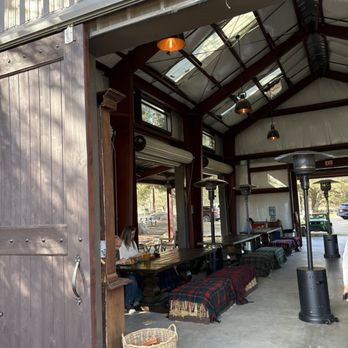 Calico Cidery - Interior with haystacks & blankets super cute! - Cideries Near Me - Julian, California