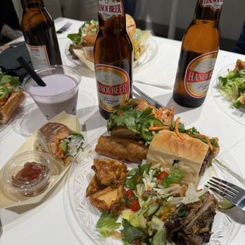 Saigon Hustle | Spring Branch - Pork Banh Mi, Honey Glazed Lemongrass Salmon Spring Rolls - TG, Fried Egg Rolls - Vietnamese Near Me - Houston, Texas Saigon Hustle | Spring Branch - Pork Banh Mi, Honey Glazed Lemongrass Salmon Spring Rolls - TG, Fried Egg Rolls - Vietnamese Near Me - Houston, Texas
