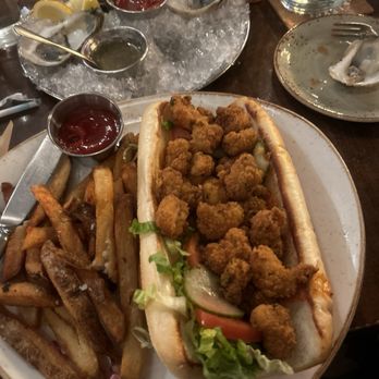 Sea Level NC - Po Boy Shrimp sandwich with huge delicious fries on side. Oysters at top. - Seafood Near Me - Charlotte, North Carolina