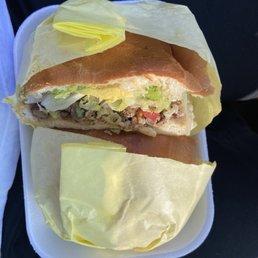 a sandwich in a styrofoam container