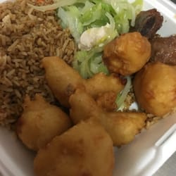 Monroe Take Out - Our Monroes new combo with rice, chow mein, honey garlic ribs, 2 chicken balls, 2 deep fried shrimp and 2 deep fried scallops with an egg
