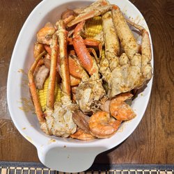 The Twisted Crab Seafood & Bar - Snow Crab Legs?, shrimp, corn, sausage