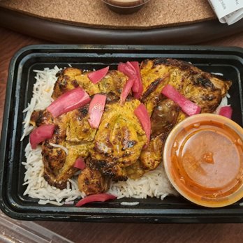 Masala Hut - a plate of chicken and rice - Indian Near Me - Parksville, British Columbia Masala Hut - a plate of chicken and rice - Indian Near Me - Parksville, British Columbia
