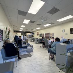 Interior - so many chairs available, only 2 people working