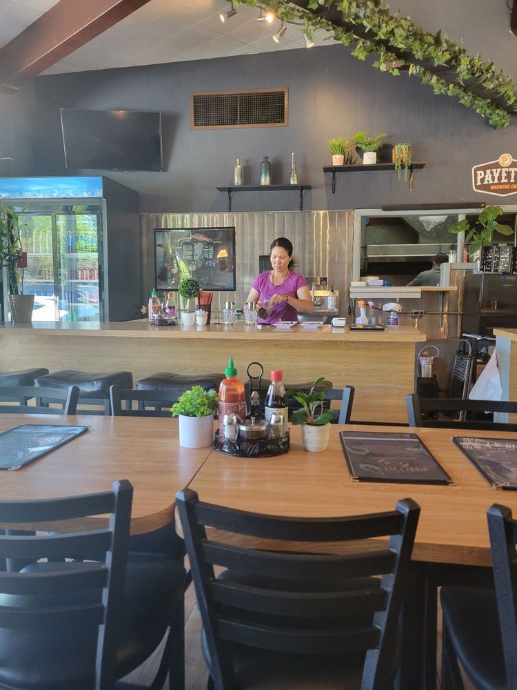 Pho Real - Friendly server making Vietnamese coffee. Only offered iced here. - interior - Vietnamese Near Me - Boise, Idaho Pho Real - Friendly server making Vietnamese coffee. Only offered iced here. - interior - Vietnamese Near Me - Boise, Idaho