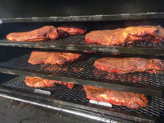 Texas-Style BBQ|100% Wood-Fueled Pit - Simply Smoked BBQ is a family-owned & operated business dedicated to bringing authentic Texas barbecue to Central Ohio. Founded in a suburb of Austin, Texas in 2017, we relocated to the greater Columbus area in 2023, driven by our obsession for great barbecue & our desire to share it with new friends & neighbors. We believe that exceptional Texas-style barbecue starts with high-quality ingredients, careful attention to detail, & a 100% wood-fueled pit—because there are no shortcuts to true flavor. Our recipes have been passed down through generations, & we smoke our meats low & slow to ensure every bite is tender, flavorful, & unforgettable. You’ll taste the difference in our brisket, ribs, & pulled pork, all smoked to perfection over real wood fires. Pride is taken in offering a full barbecue experience, including scratch-made sauces, sides, & desserts that perfectly complement our smoked meats. The menu features favorites like creamy mac & cheese, tangy coleslaw, & classic potato salad, all made in-house for the freshest taste. We are committed to delivering exceptional customer service & making every event memorable. Our catering services are designed to meet the needs of any occasion, from weddings & corporate meetings to family gatherings & office parties. Menus are fully customizable, so you can mix & match dishes to suit your guests’ tastes.