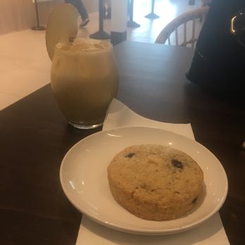 Nehemiah Coffee Co - Golden hour iced latte and an apricot blueberry scone - Coffee & Tea Near Me - Arlington, Texas Nehemiah Coffee Co - Golden hour iced latte and an apricot blueberry scone - Coffee & Tea Near Me - Arlington, Texas