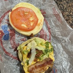 Wendy's - Skimpy wilted lettuce, tomato, and 1/2 slice of bacon.