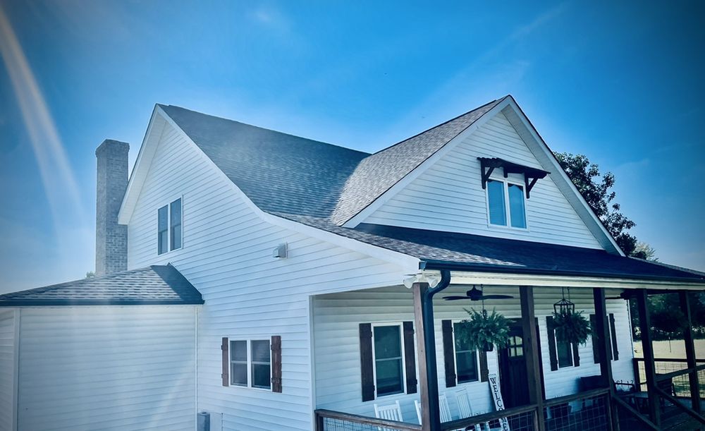 Slide of Nelms Roofing Co