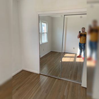Ek Construction Design - a man taking a selfie in a mirror - Decks & Railing Near Me - Bronx, New York Ek Construction Design - a man taking a selfie in a mirror - Decks & Railing Near Me - Bronx, New York