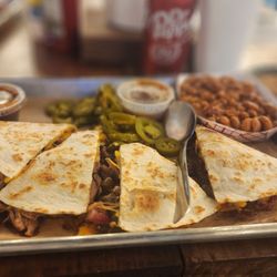 OAK'D BBQ - Brisket quesadilla with side of baked beans