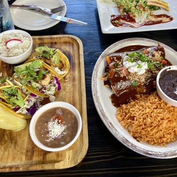 Sol Agave - Tacos Del Mar (left) / chicken mole enchiladas (right) -- not a full entree on menu but can ask for them with rice & beans. Fantastic sauce - Mexican Near Me - San Clemente, California Sol Agave - Tacos Del Mar (left) / chicken mole enchiladas (right) -- not a full entree on menu but can ask for them with rice & beans. Fantastic sauce - Mexican Near Me - San Clemente, California