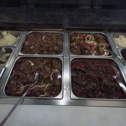 Dominican Grill Chicken Pizza - Chivo, carne de res, pollo guisado ,