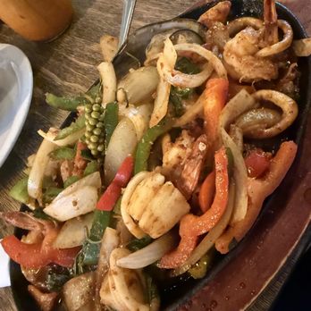 Andaman Thai - Seafood Hot Plate - Prawns, scallops, calamari, fish and mussel with peppercorn, bell pepper, onion, ginger root and basil - Thai Near Me - San Ramon, California