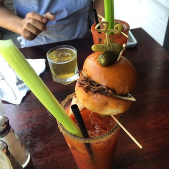 The Attic - "Meaty Man" Bloody Mary for me and the spicy Jalapeño Bloody Mary in the back. The jalapeño Bloody Mary came with a little beer - Breakfast & Brunch Near Me - Long Beach, California