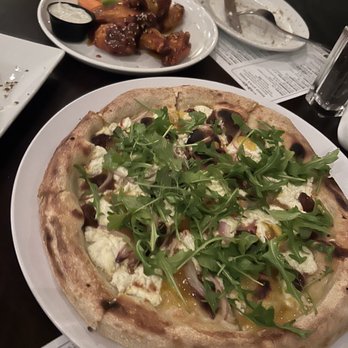 Ember Woodfire Grill - Goat cheese and arugula pizza - New American Near Me - Livonia, New York