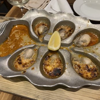 Cochon RESTAURANT - Wood Fire Oysters with Chill Garlic Butter - Cajun/Creole Near Me - New Orleans, Louisiana
