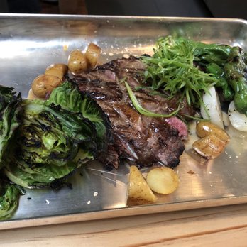 Mägo - The ribeye entrée - a true culinary sight to behold and served on a literal silver platter - Colombian Near Me - Oakland, California Mägo - The ribeye entrée - a true culinary sight to behold and served on a literal silver platter - Colombian Near Me - Oakland, California