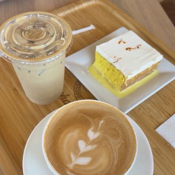 MoQana - House latte (hot), pistachio latte (cold), saffron milk cake - Coffee & Tea Near Me - Edmond, Oklahoma MoQana - House latte (hot), pistachio latte (cold), saffron milk cake - Coffee & Tea Near Me - Edmond, Oklahoma