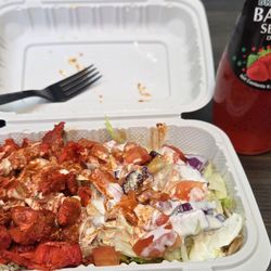 Halal Food & Ice Cream - Spicy chicken over rice plate