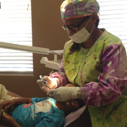 Radford Dental Wellness for Young People - Dr. Rhea E. Radford, pediatric dentist in Pearland, TX.
Providing extra gentle care to her patient with the parent close by.