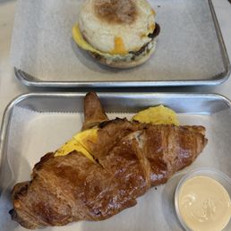 Top: Egg cheese and sausage on english muffin Bottom: Egg and cheese croissant Top: Egg cheese and sausage on english muffin Bottom: Egg and cheese croissant