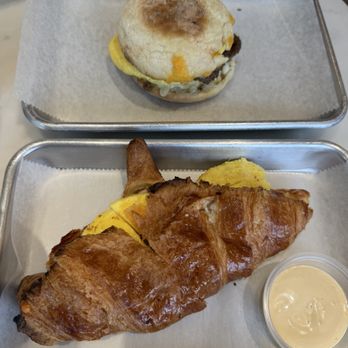 Underdog Coffee & Bread - Top: Egg cheese and sausage on english muffin Bottom: Egg and cheese croissant - Breakfast & Brunch Near Me - Annandale, Virginia Underdog Coffee & Bread - Top: Egg cheese and sausage on english muffin Bottom: Egg and cheese croissant - Breakfast & Brunch Near Me - Annandale, Virginia