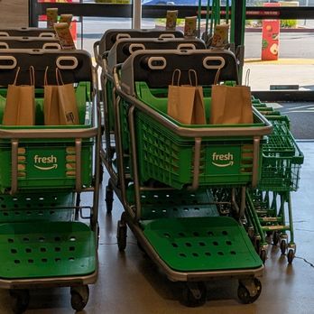 Amazon Fresh - High-tech shopping carts with provided bags and ability to check out right on the cart - Grocery Near Me - Roseville, California