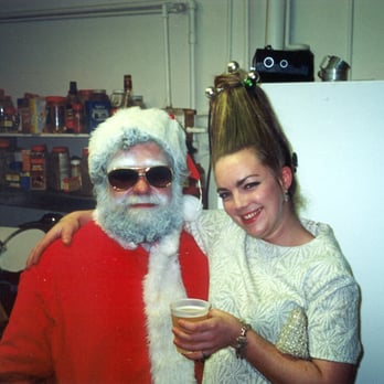 Night of 100 Elvises - Santa warming up in the kitchen - Festivals Near Me - Baltimore, Maryland